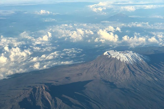 Best Kilimanjaro hiking day trip tour with Kilinge Adventures - Rain, cloud, and the right equipment