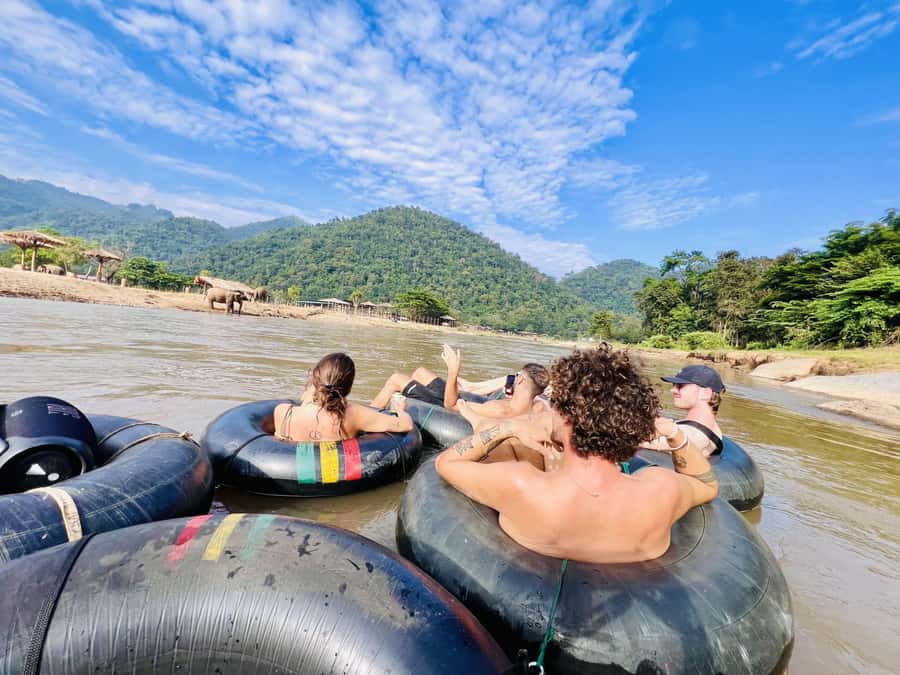 Chiang Mai Adventure: Trekking, Tubing & Waterfall Slide - Thai lunch and a base camp built for wet clothes