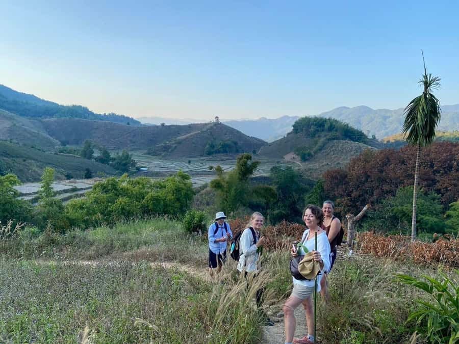 Chiang Rai: 1-Day Trekking and Longtail Boat Trip - Cooling off at Huay Kaew Waterfall