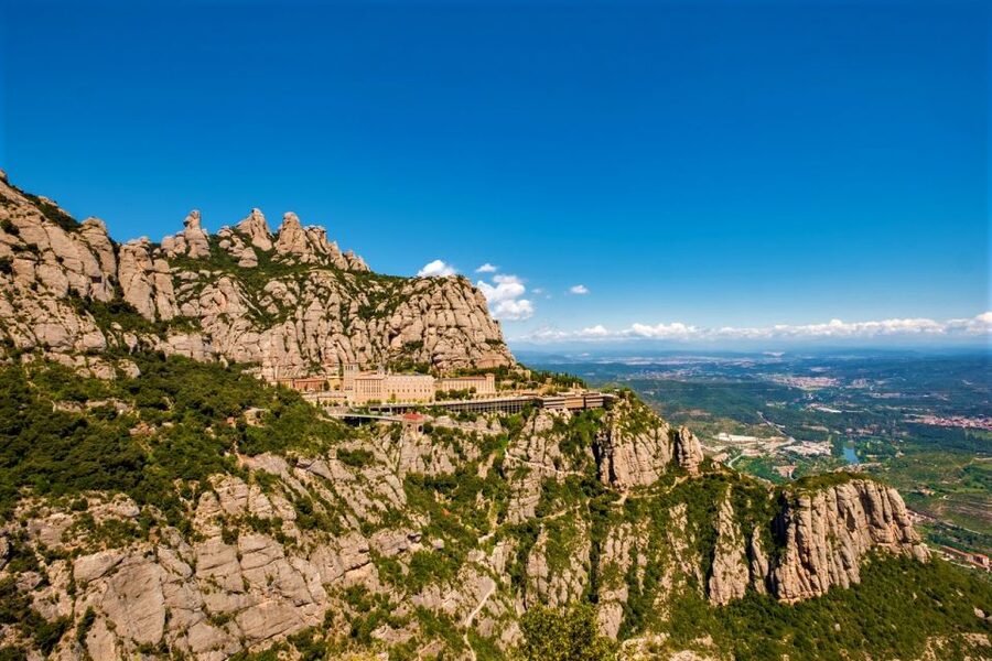 From Barcelona: Montserrat Monastery, Easy Hike, Cable Car - Entering Santa Maria de Montserrat