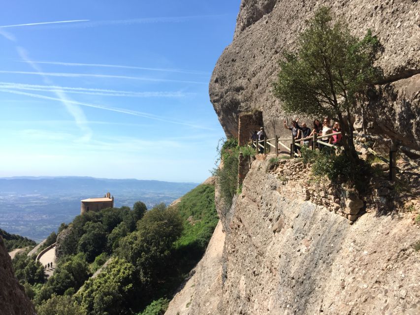 From Barcelona: Montserrat Monastery & Scenic Mountain Hike - Free time for the market and local tastes