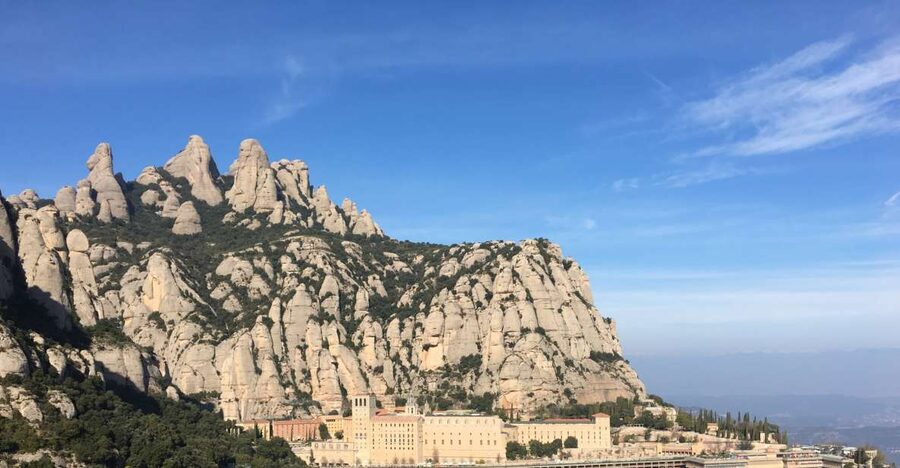 From Barcelona: Montserrat Mountain Hike and Abbey Tour - Inside The Benedictine Abbey