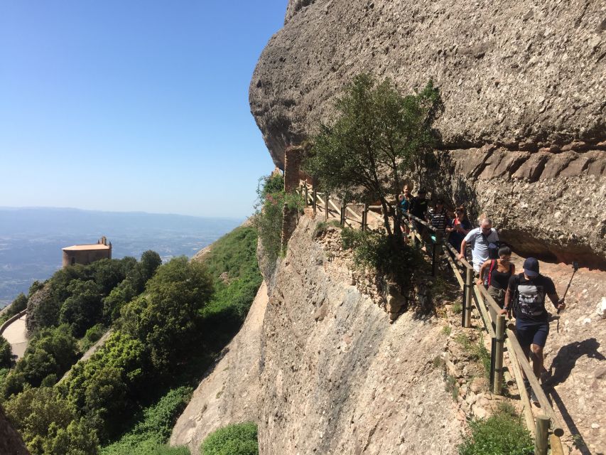 From Barcelona: Montserrat Mountain Hike and Abbey Tour - Hiking Through The Nature Park
