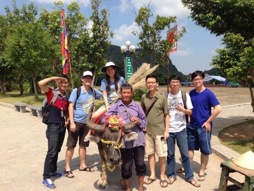From Hanoi: Hoa Lu, Hang Mua Hike, Tam Coc Boat, and Lunch - Cruising Tam Coc by traditional sampan