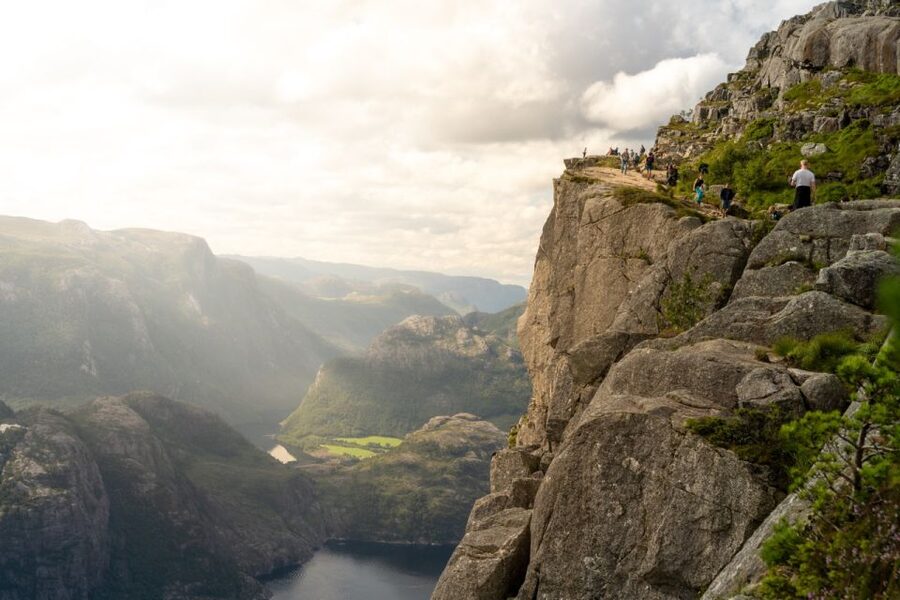 From Stavanger: Pulpit Rock Guided Hike with Pickup - Reaching the 604-meter cliff above Lysefjorden