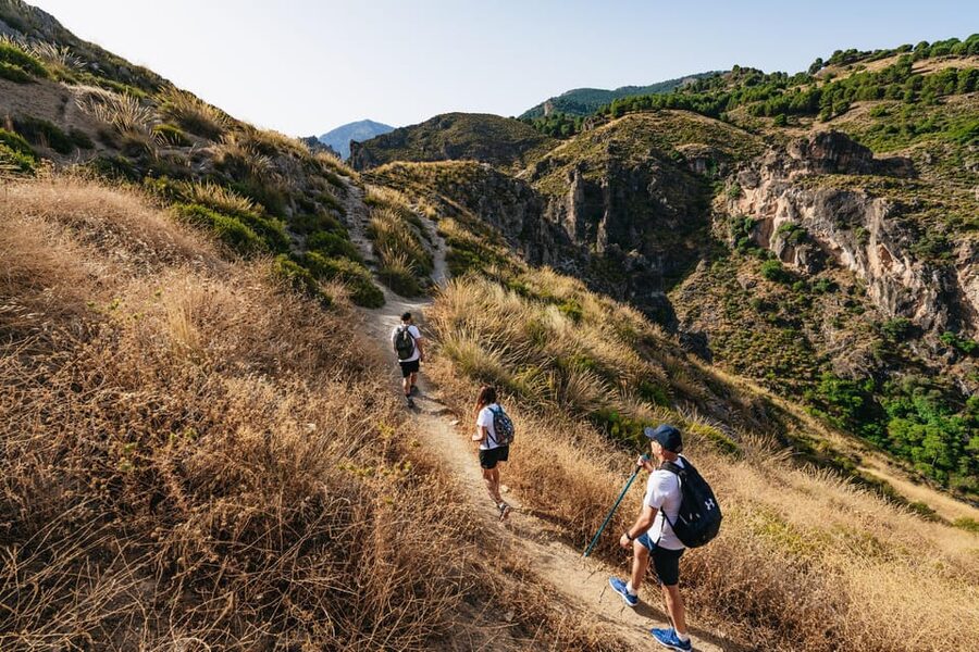 Granada: Los Cahorros de Monachil Canyon Hiking Tour - Walking beside the Monachil River