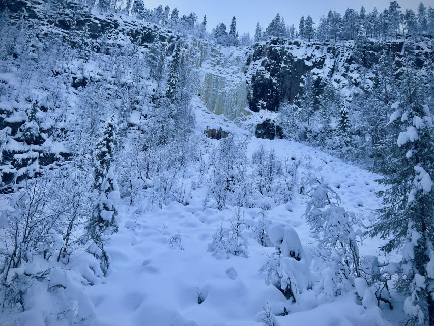 Korouoma: Frozen Waterfall Hiking Tour - A Lapland barbecue beside the fire