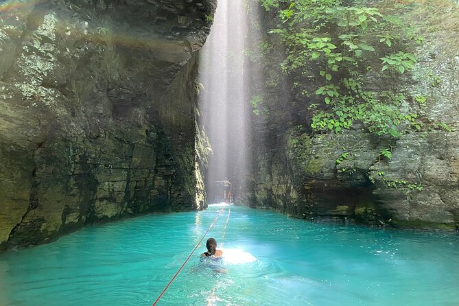La Leona Waterfall Hike and River Tubing - River Tubing Through Rock and Rapids
