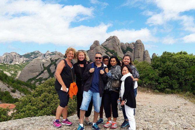 Montserrat Half Day with Cable Car and Easy Hike from Barcelona - Entering the Montserrat Monastery and Basilica