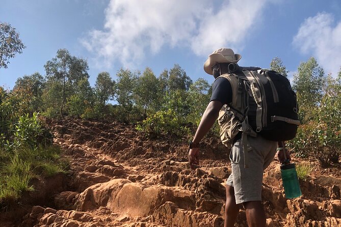 Mount Kigali Hike and Zipline Adventure Tour(Pick up &drop off) - Two views from the Mount Kigali summit