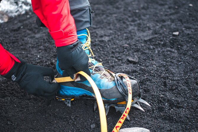 Private Guided Hike Experience on Sólheimajökull Glacier - Getting fitted with crampons and safety gear