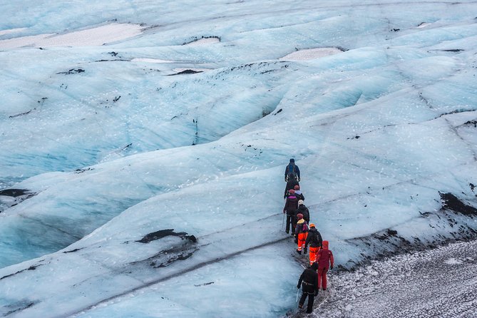 Sólheimajökull Glacier Hike - Small Group Blue Ice Adventure - Blue ice, moulins, and the glacier lesson