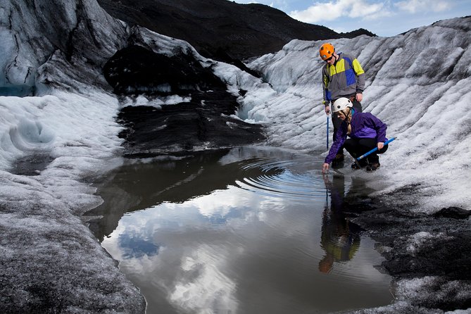 Sólheimajökull Glacier Hike - Small Group Blue Ice Adventure - Crampons, helmets, and the first steps on Sólheimajökull