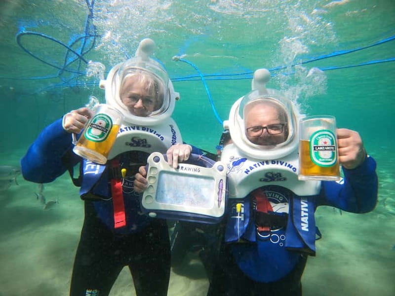 Tenerife: Underwater Walk - Sea Trek Experience - Entering the water with a Sea Trek helmet