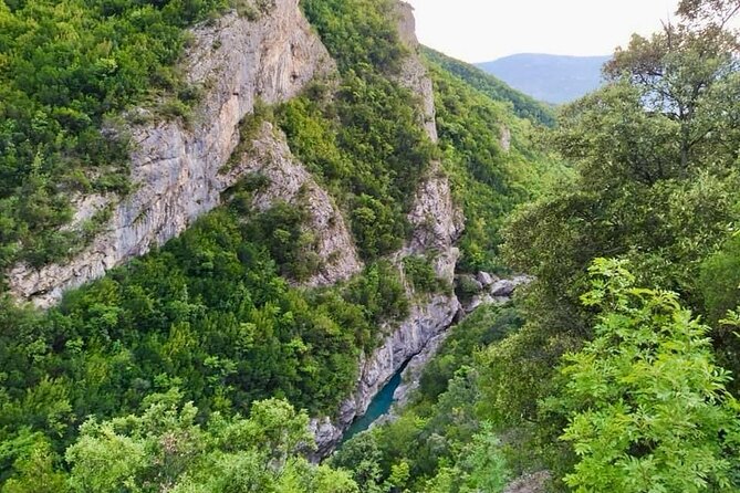 Tirana Semi-Private Hiking Tour of Pellumbas Cave & Erzeni Canyon - Inside a cave with 40,000 years of stories
