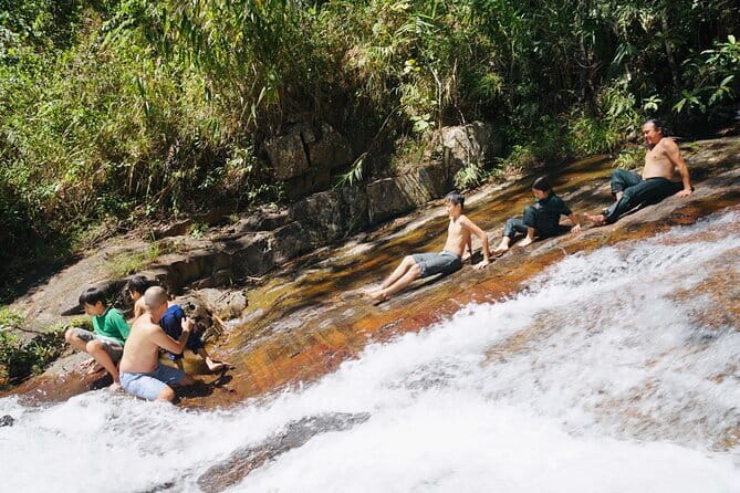 Trekking Tour to Hidden Waterfall & Sturgeon Farm for dog-lovers - Starting at Twin Beans Farm in Da Lat