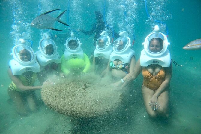 Underwater Sea Trek in San Juan: Explore Beneath the Waves - Walking slowly into the protected cove